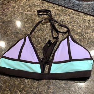 green and purple bikini top with black outline